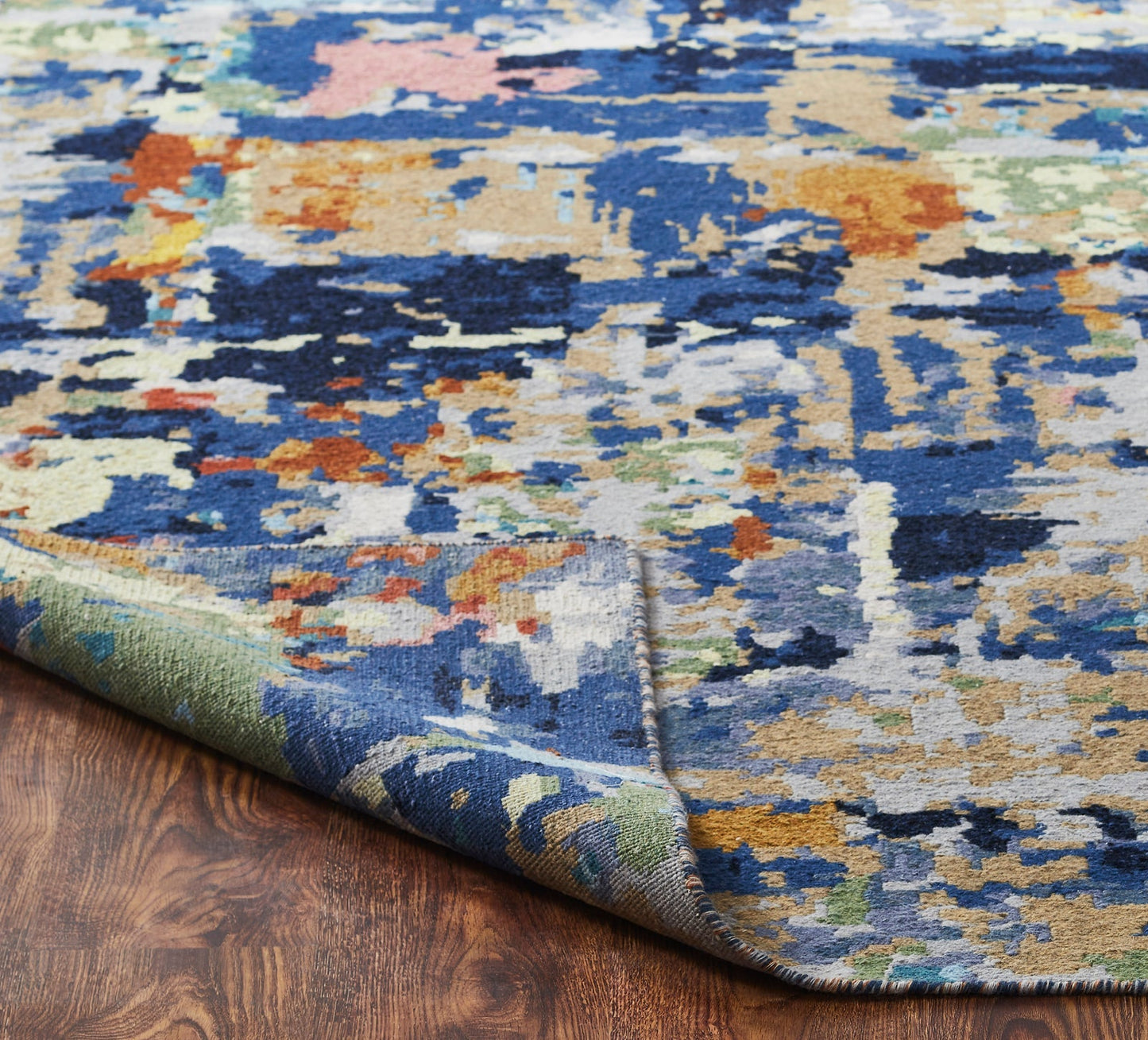 Corner lifted up on Blue, Red Multi Color Abstract Sullivan Collection Area Rug