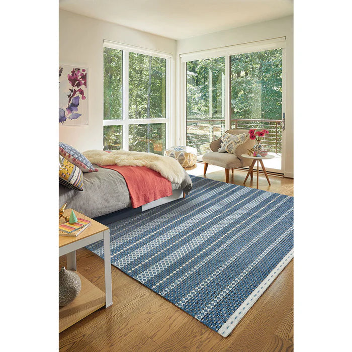 Living room set up with Alpine Collection Blue imported area rug