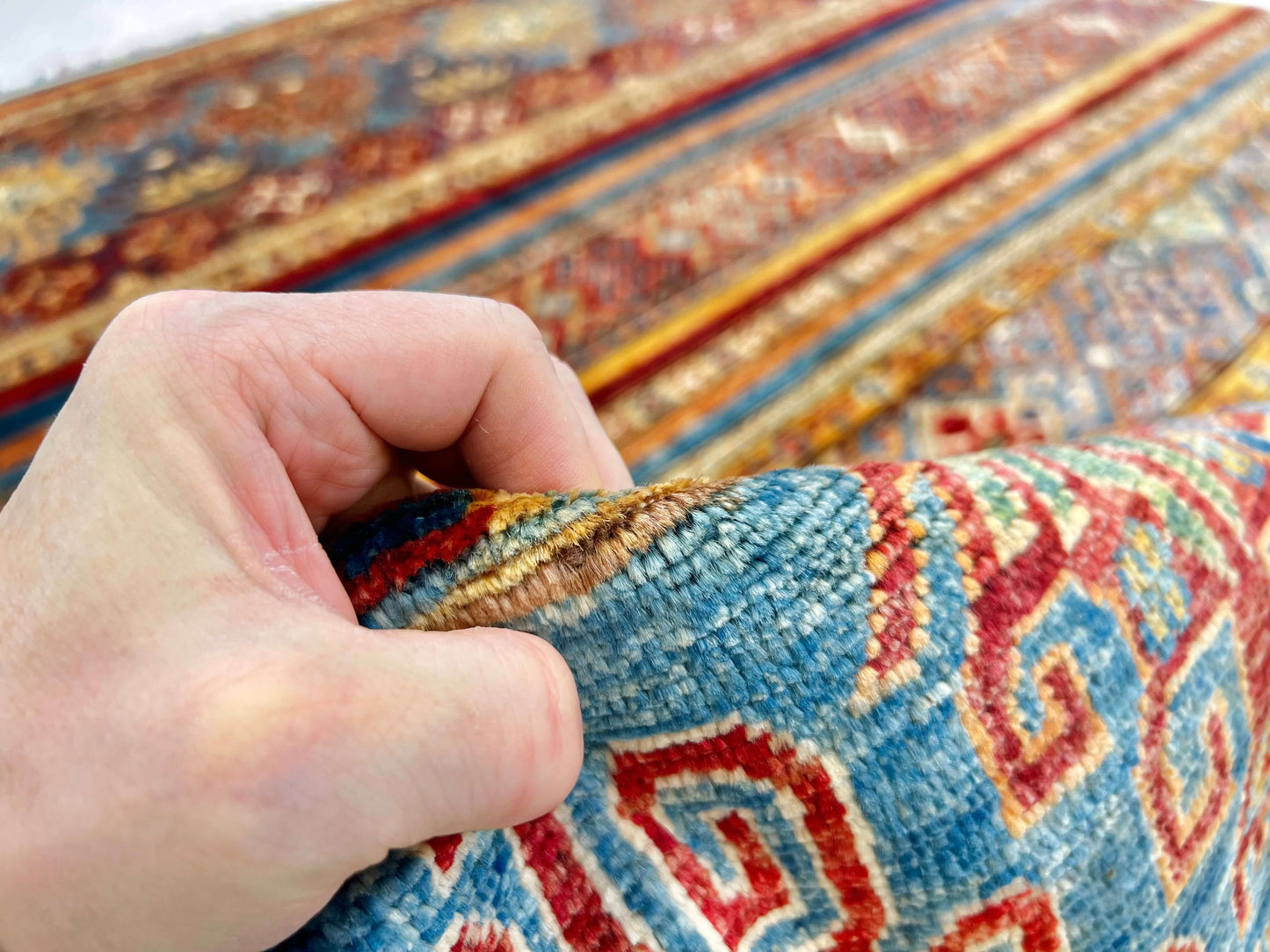 Khorjin (6'01"x8'07") blue/mulitcolor