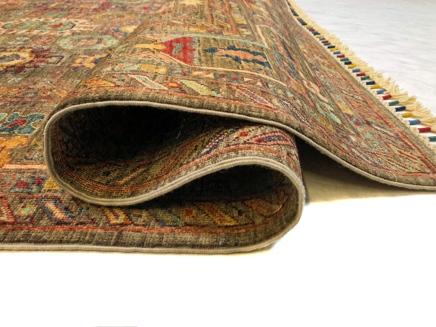 Khorjin (5'06"x7'08") camel/jewel tones