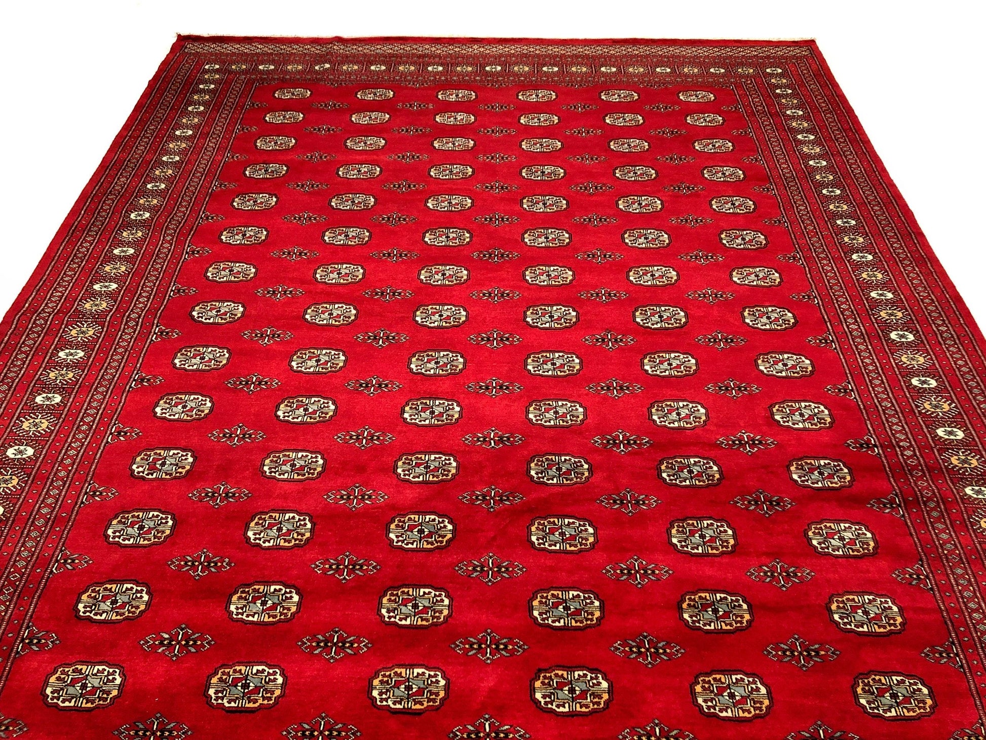 Red area rug with gold/yellow design Bokhara (9x12)
